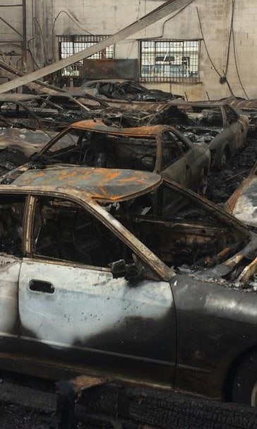 Car warehouse next to pot-growing operation damaged by fire